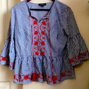 Girls dress shirt with red tassels